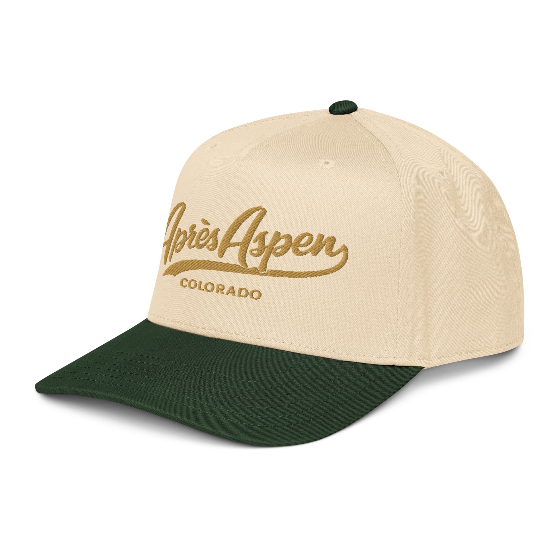 Angled front left view of Gold Après Aspen hat with cream crown, dark green brim, and old gold embroidered Aspen logo.