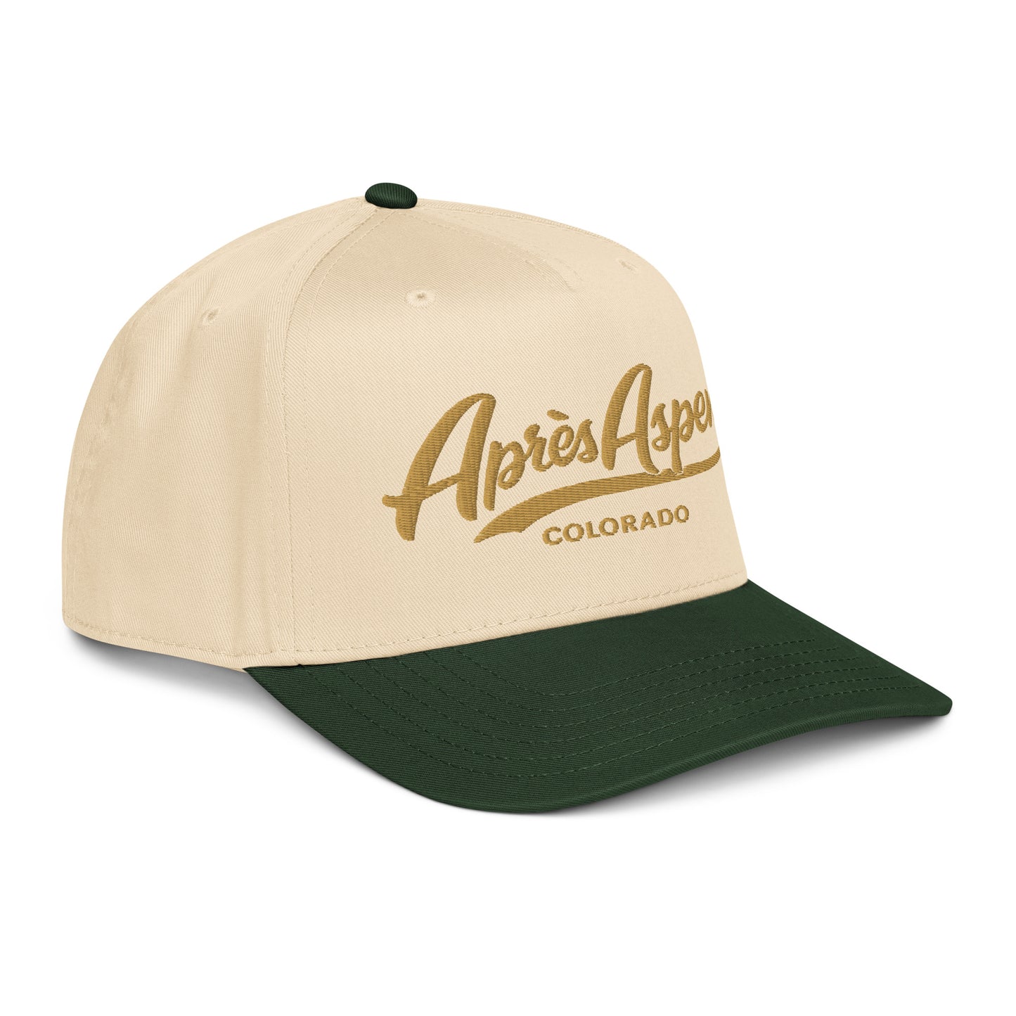 Angled front right view of Gold Après Aspen hat with cream crown, dark green brim, and old gold embroidered Après Aspen Colorado logo.