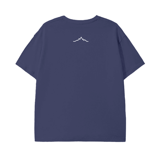 Back view of Piste Out Logo Tee in Blue Square color, showing plain dark blue cotton fabric with clean stitching and classic unisex fit.