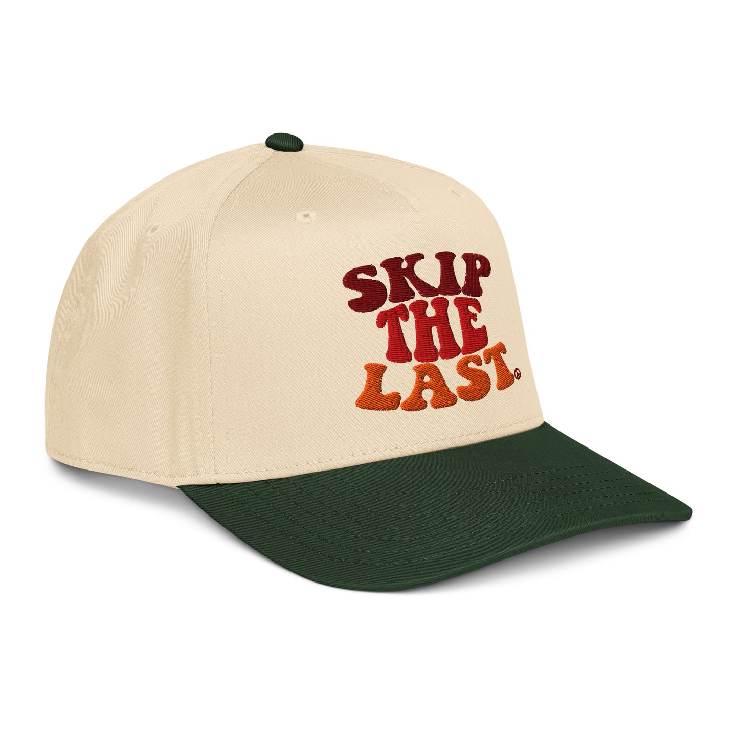 Right angled view of the Skip the Last hat in Green Circle cream crown, green circle brim, and vintage ski lettering.
