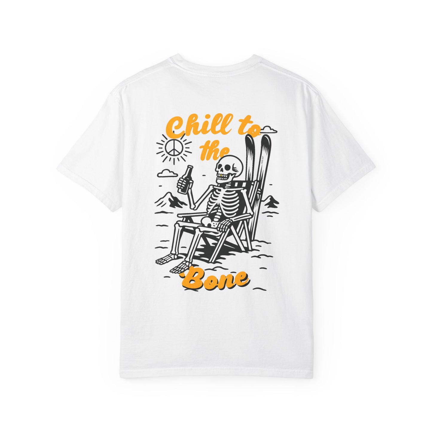 Back of white tee featuring laid-back skeleton with skis, beer, and bold “Chill to the Bone” graphic