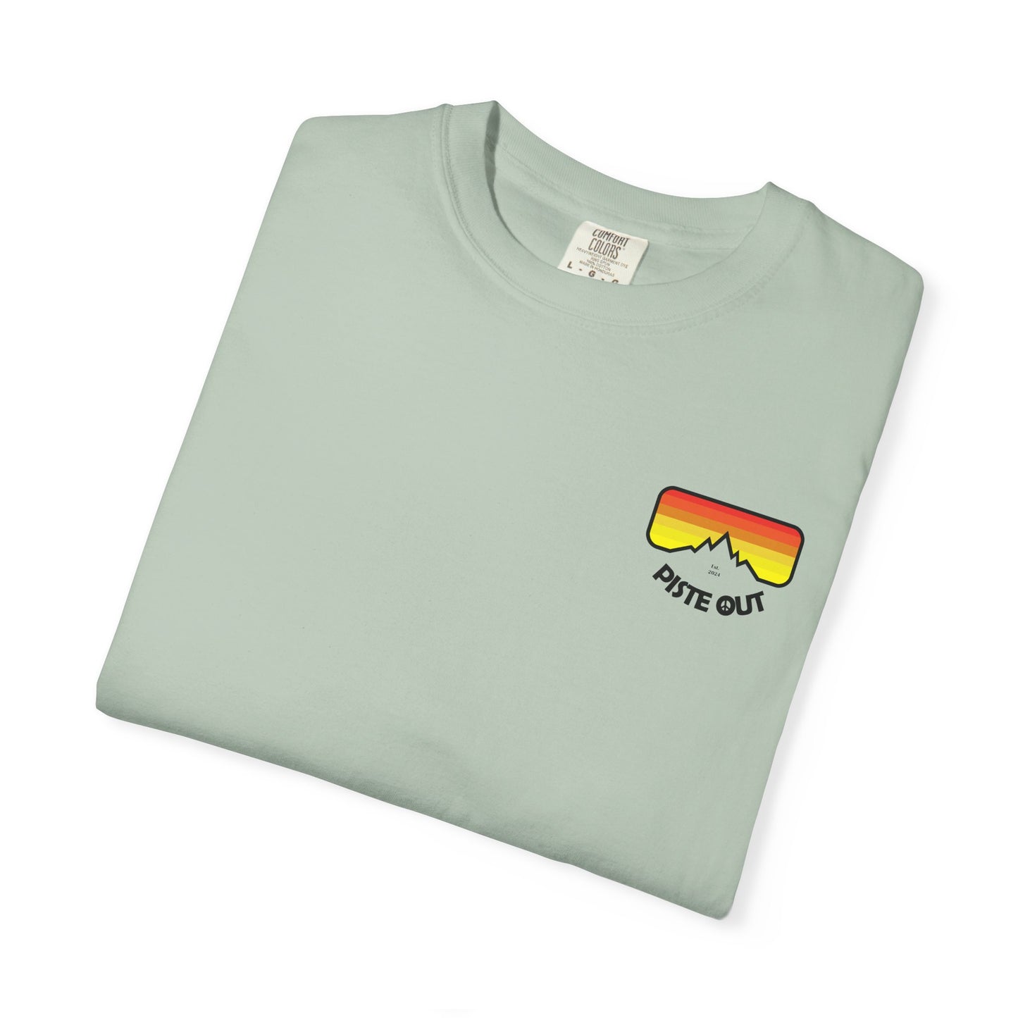 Sage green tee folded flat showing retro goggles logo on front
