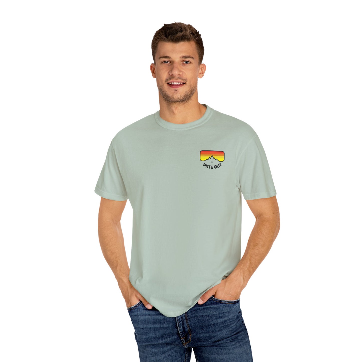 Model wearing sage green tee, front view with chest goggles logo