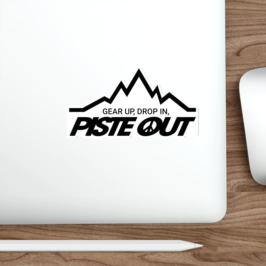 Sticker placed on white laptop, showing sharp black mountain lines logo with bold slogan and peace sign