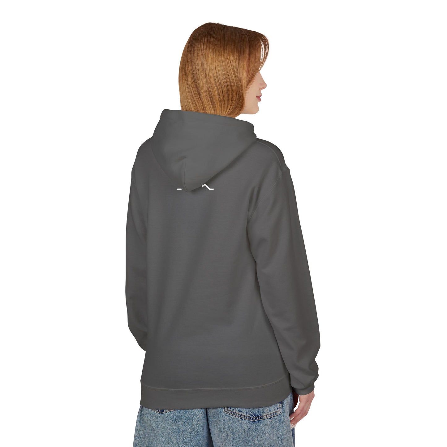 Model wearing charcoal hoodie, back view showing small mountain back logo