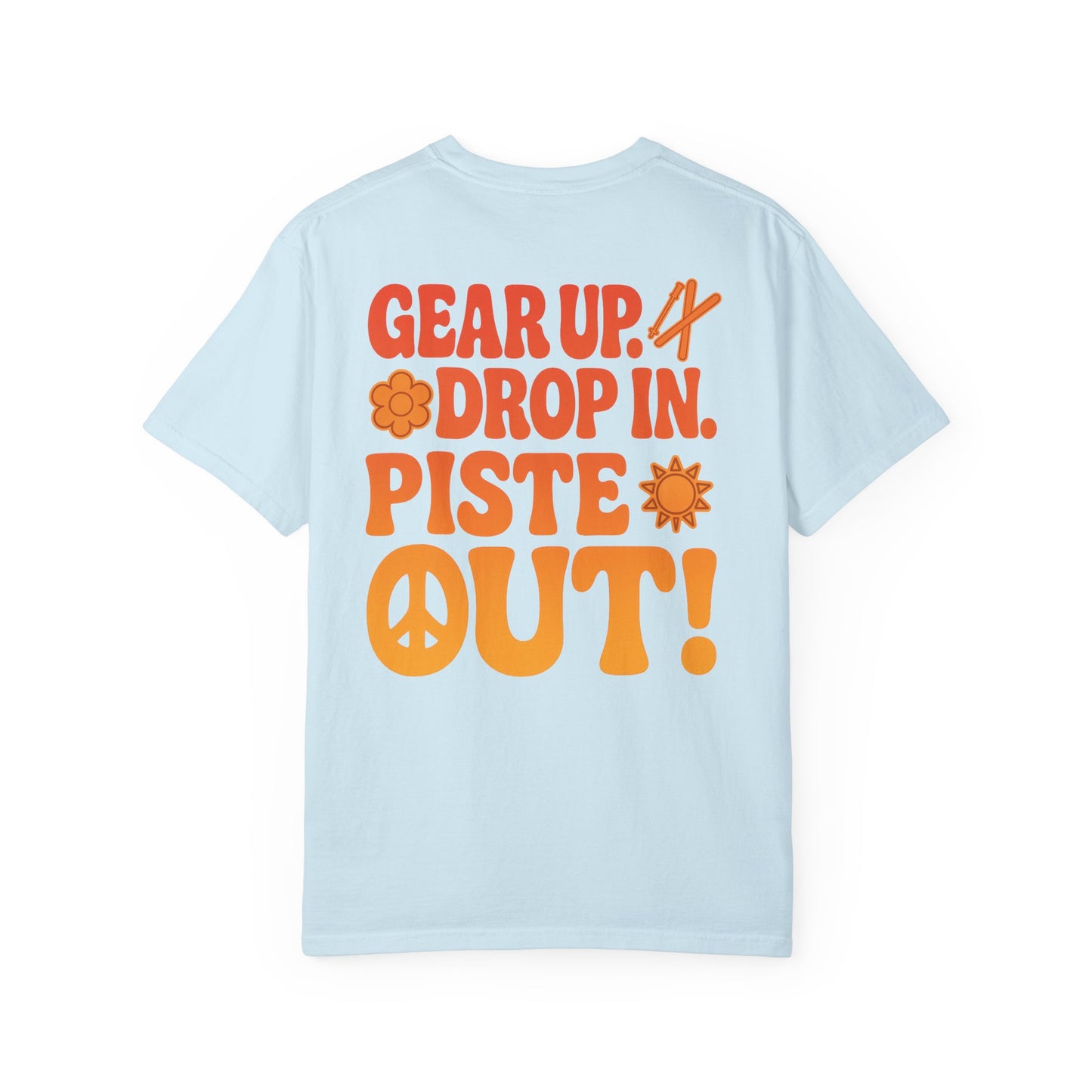 Back of light bliue tee with large retro orange “Gear Up. Drop In. Piste Out!” slogan print