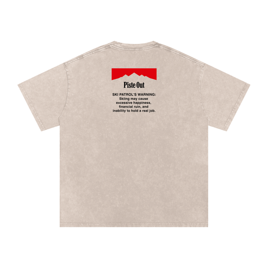 Skiing Kills Tee in Tan with Ski Patrol warning graphic on upper back, back view