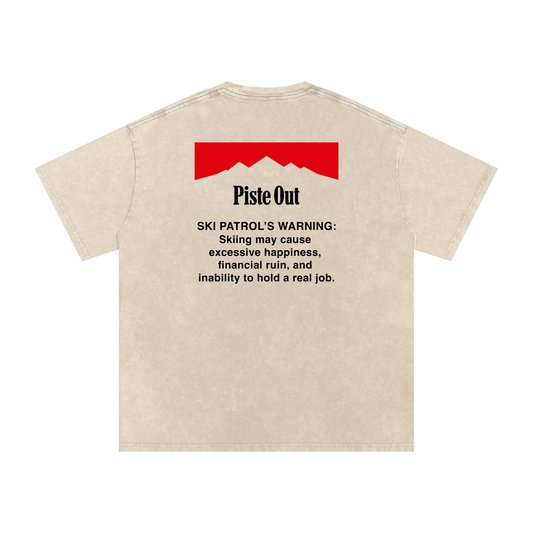 Skiing Kills Tee in Tan with Ski Patrol warning graphic on upper back, back view