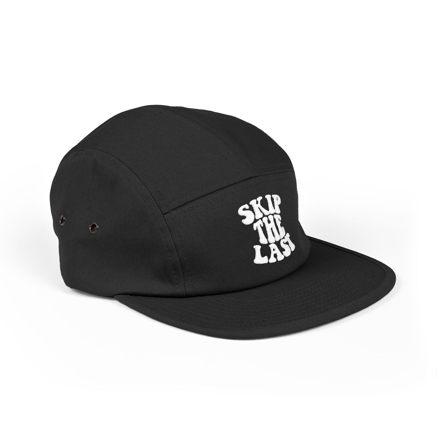 Side view of black Skip the Last 5-panel camper hat with embroidered ski superstition slogan.