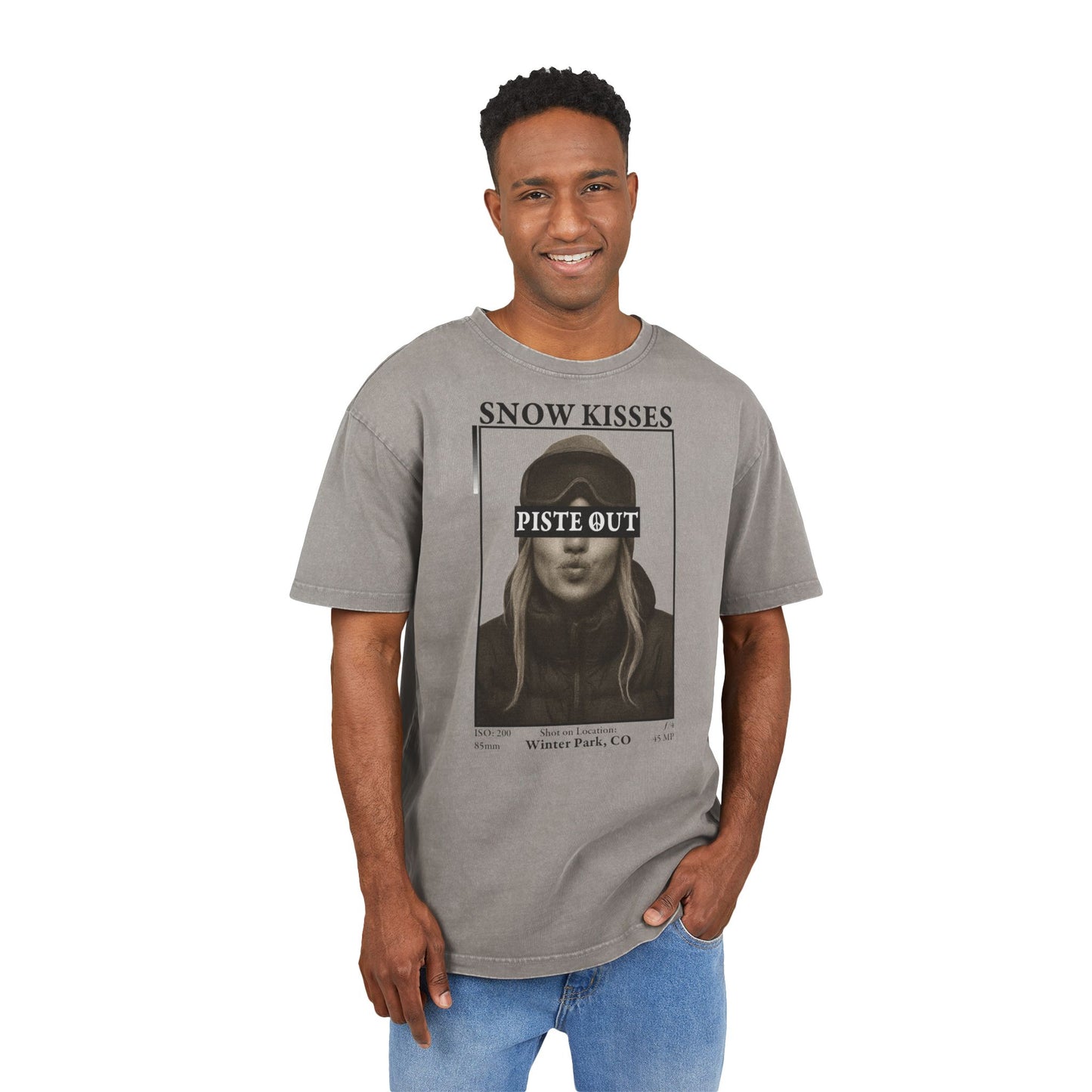 Model wearing Asphalt Snow Kisses Piste Out graphic ski t-shirt, front view.