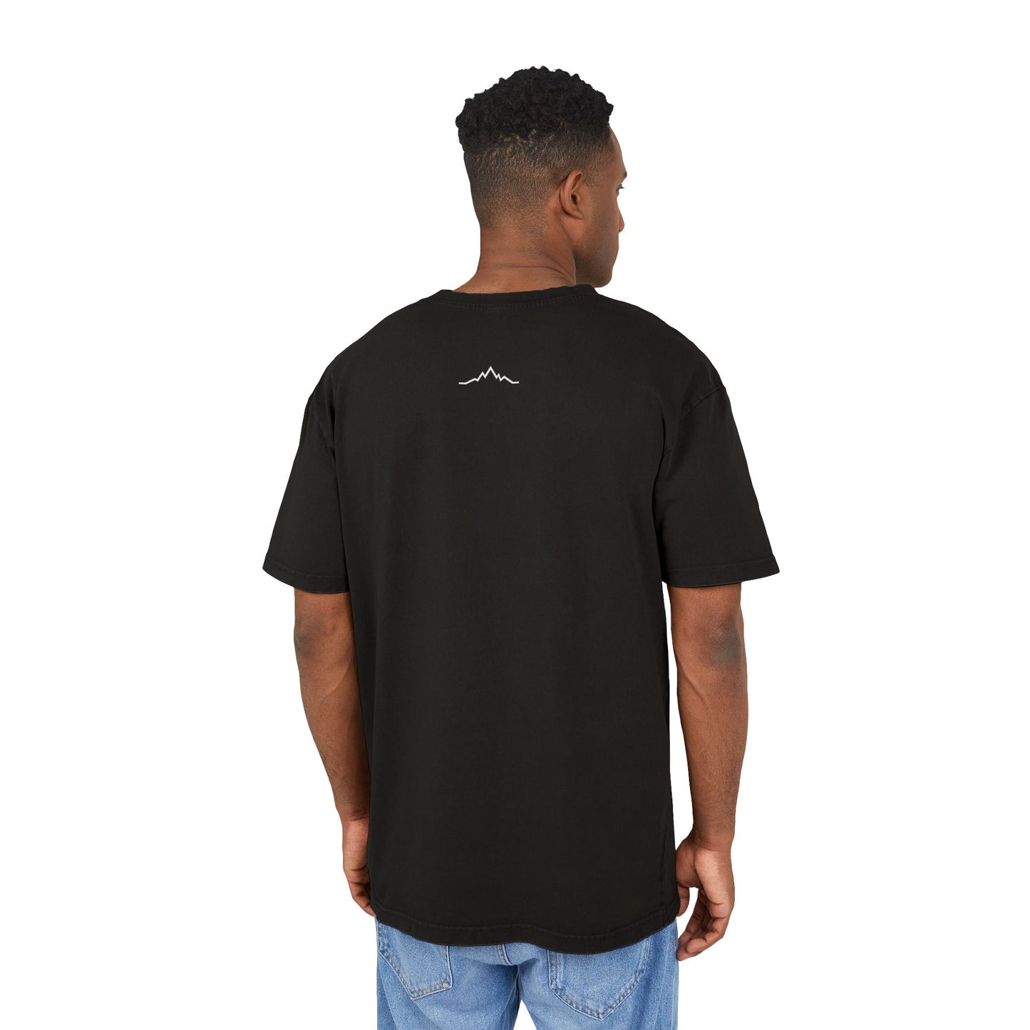 Model in black tee, showing back mountain lines logo centered under collar