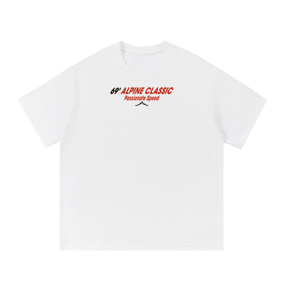 Snow 69’ Alpine Classic tee front view with small red and black chest logo and mountain submark.
