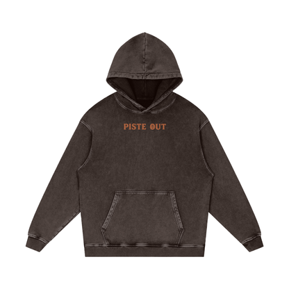 Front view of espresso brown Colorado Cowboy hoodie with orange “PISTE OUT” chest logo on sun-faded wash.
