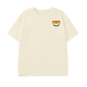 Front view of the Piste Out Logo Tee in cream, showing the signature logo design on a light brown cotton shirt. Casual unisex fit, short sleeves, round neck.