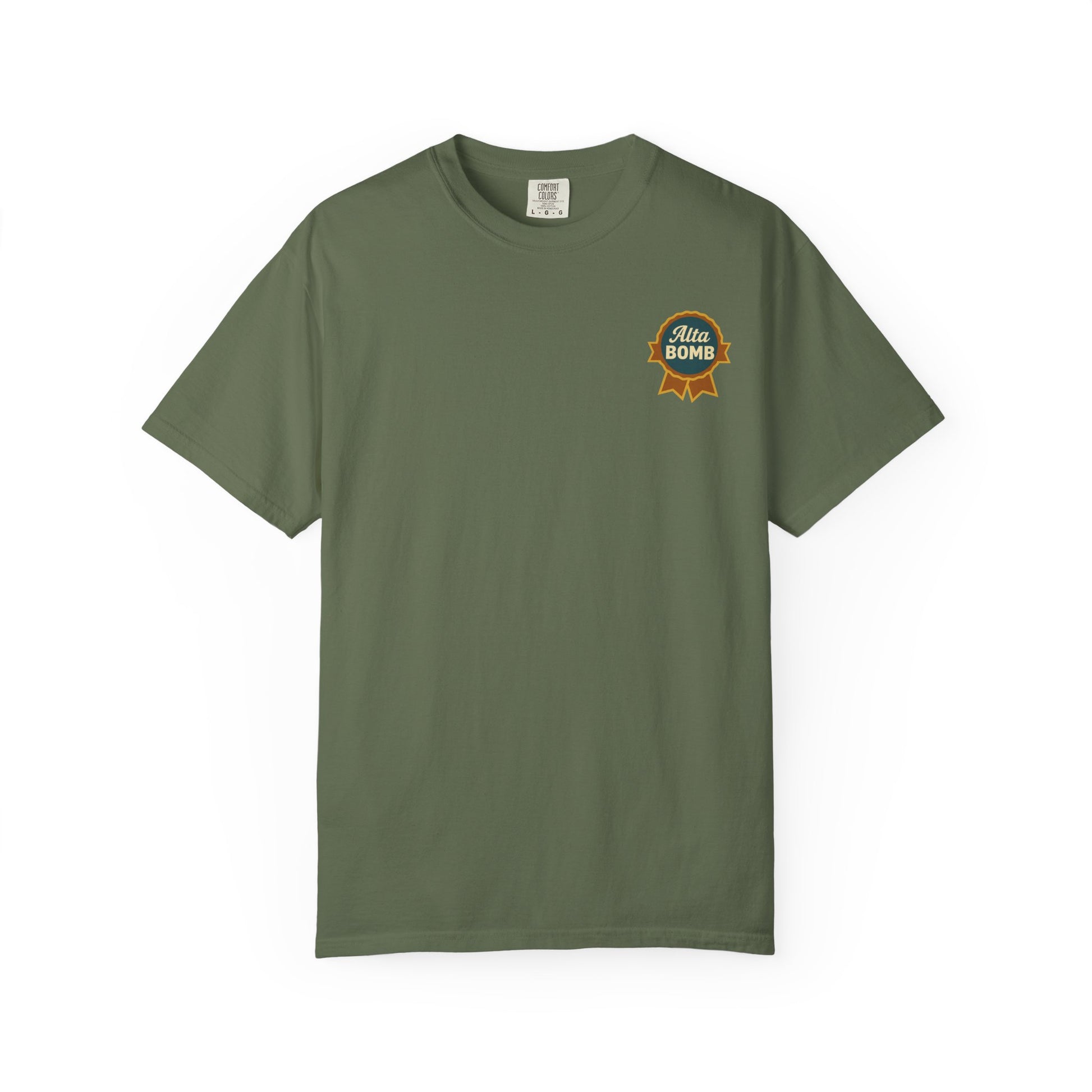 Flat lay forest green Alta Bomb t-shirt with ribbon badge chest design.