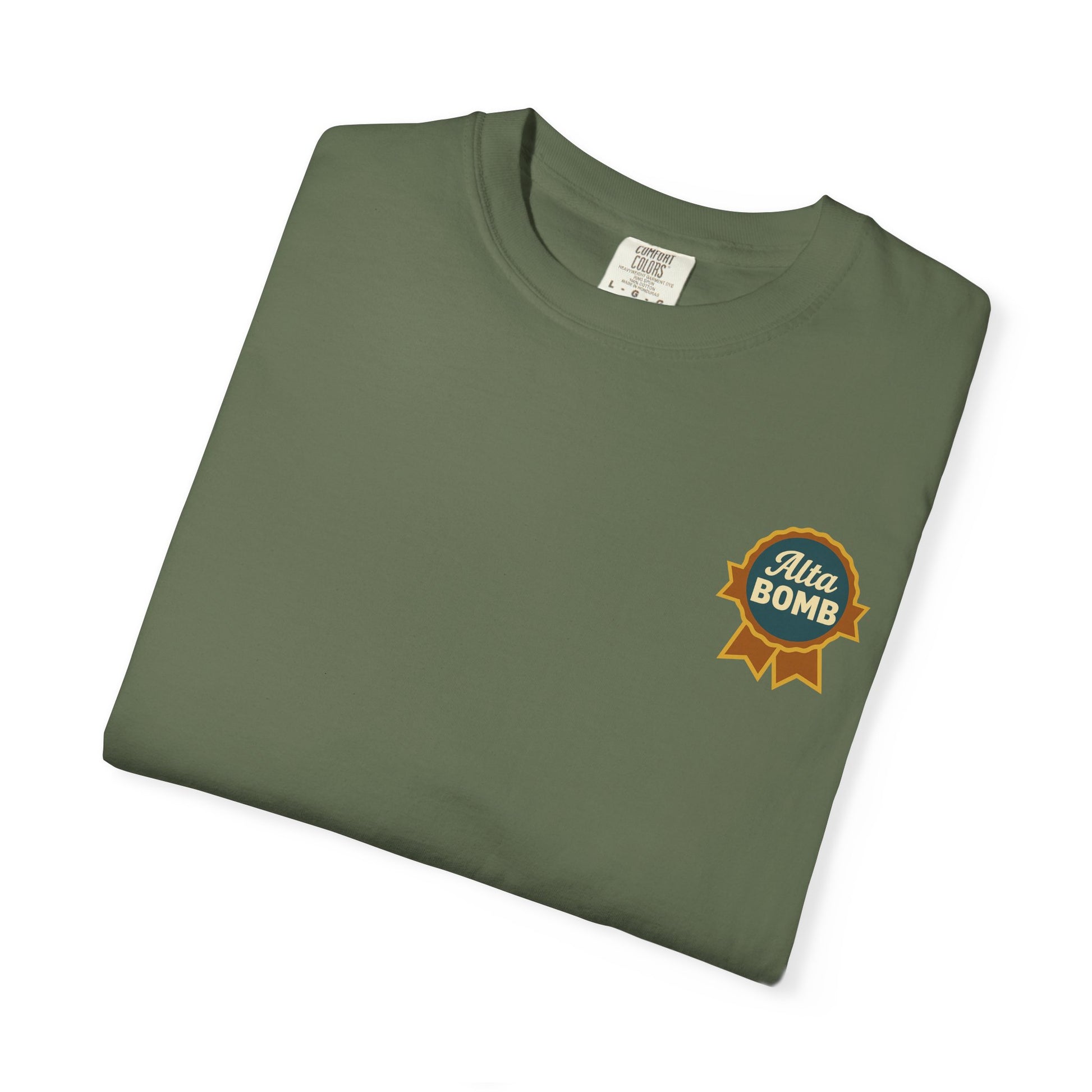 Folded gray Alta Bomb t-shirt with Alta Bomb ribbon badge chest design.