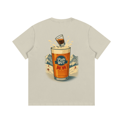Back view of khaki Alta Bomb tee with shot dropping into beer pint and mountain backdrop.