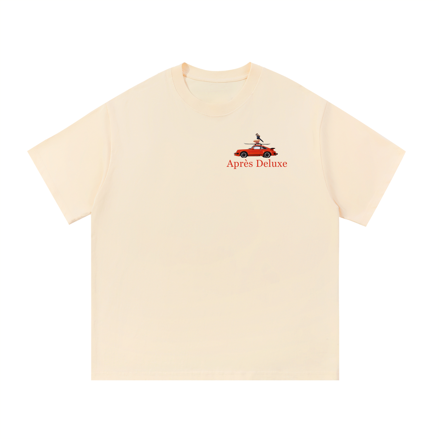 Cream Après Deluxe tee front view with small left-chest red “Après Deluxe” text and mini red car graphic with skier on skis.