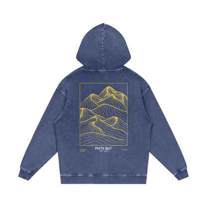 Back view of Blue Square Backcountry Veins hoodie featuring gold topographic mountain line design with “Piste Out Est. 2024” text.
