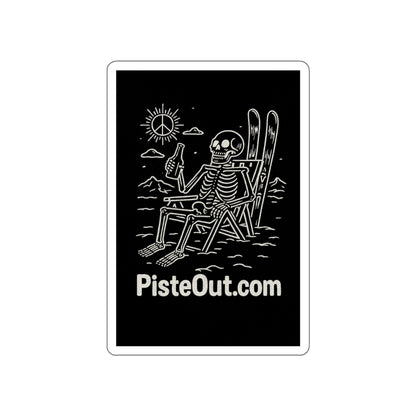 Close-up of rectangular black sticker featuring a skeleton in a lounge chair with skis, beer, and peace-sign sun; “PisteOut.com” at the bottom
