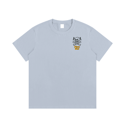 Front view of blue bird Chill to the Bone tee with skull and crossed ski poles logo and orange Piste Out text.