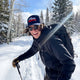 Gone Skiing Trucker Hat in Blue Square worn by a male skier on a snowy backcountry trail with ski poles