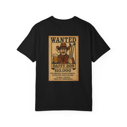Back of black tee featuring retro “WANTED” poster of a cowboy holding a beer and skis