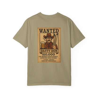 Back of khaki tee featuring retro “WANTED” poster of a cowboy holding a beer and skis