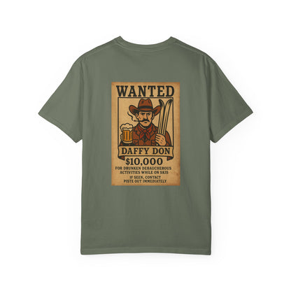 Back of green tee featuring retro “WANTED” poster of a cowboy holding a beer and skis
