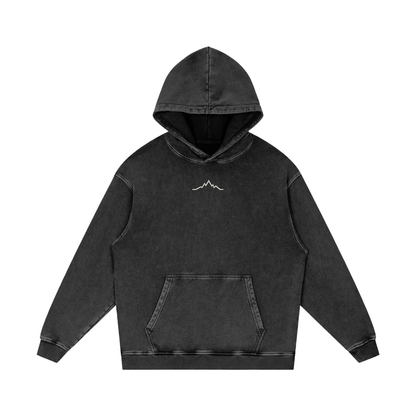 Front view of Black Diamond Grand Line Hoodie with minimalist mountain line logo on chest, printed on vintage snow-washed cotton fabric.