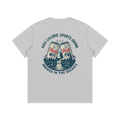 Back view of light gray High Calorie Sports Drink après ski tee featuring navy and red vintage beer can design and “Brewed in the Rockies” text.
