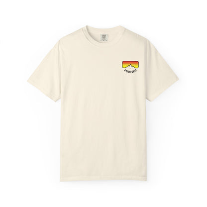 Front of cream tee with retro goggle logo on left chest