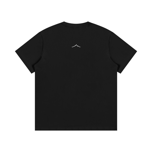 Back view of black Piste Out logo tee in solid black with no visible back graphic.