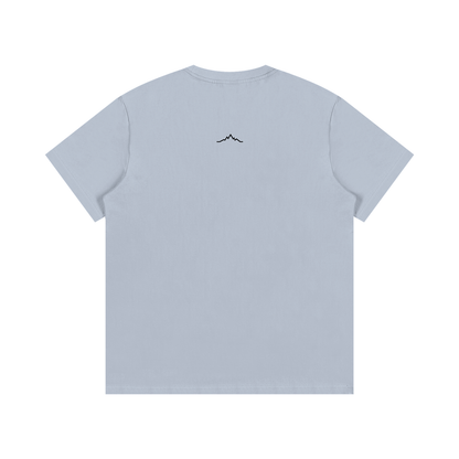 Back view of blue Piste Out logo tee in solid blue with no back graphic.