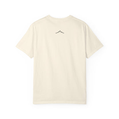 Back of beige tee, with mountain lines logo centered under neck line