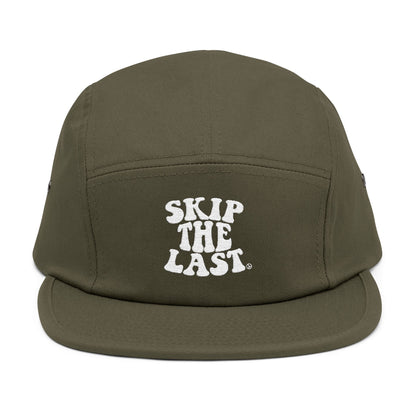Front view of olive green Skip the Last 5-panel ski superstition hat with white embroidered text.