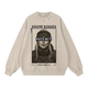 Front view of light apricot Snow Kisses vintage crewneck featuring ski town crush graphic and Piste Out logo across goggles.