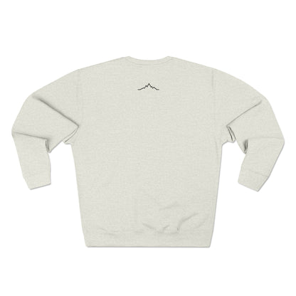 Back view of oatmeal Snow Kisses crewneck sweatshirt with minimalist mountain line logo at neckline.