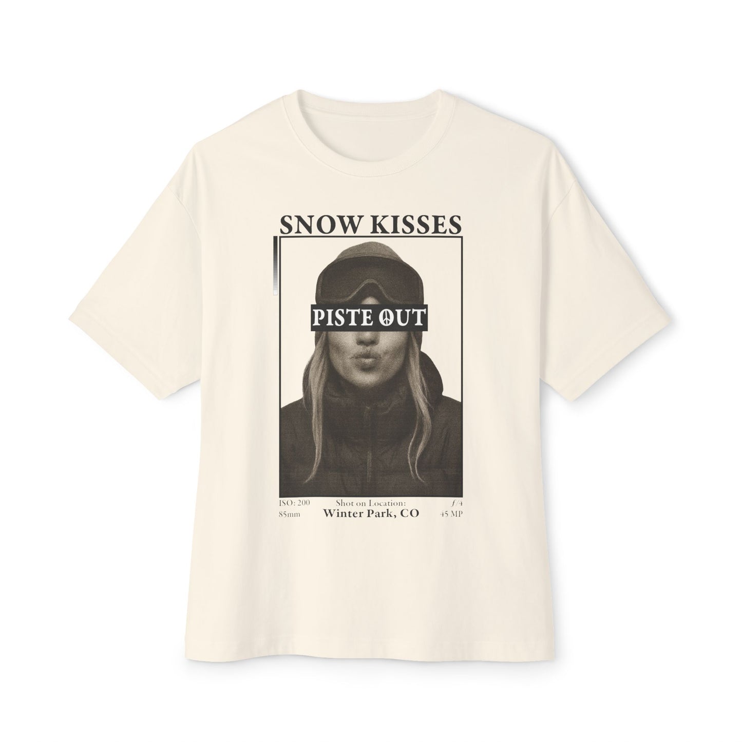 Snow Kisses graphic t-shirt in cream with ski portrait print and bold Piste Out branding.