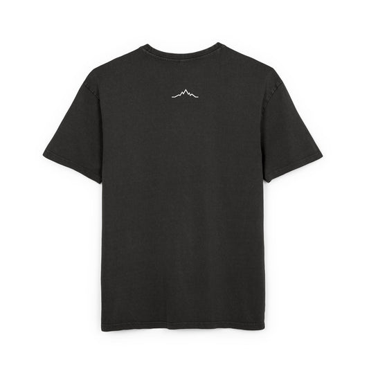 Back of black tee showing minimalist mountain line logo under collar